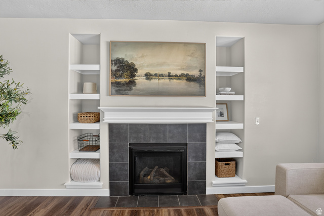 2178 Autumn Drive Mapleton, UT 84664 - Photo 15 of 48 Built-in electric fireplace with a dark tile surround and white mantel