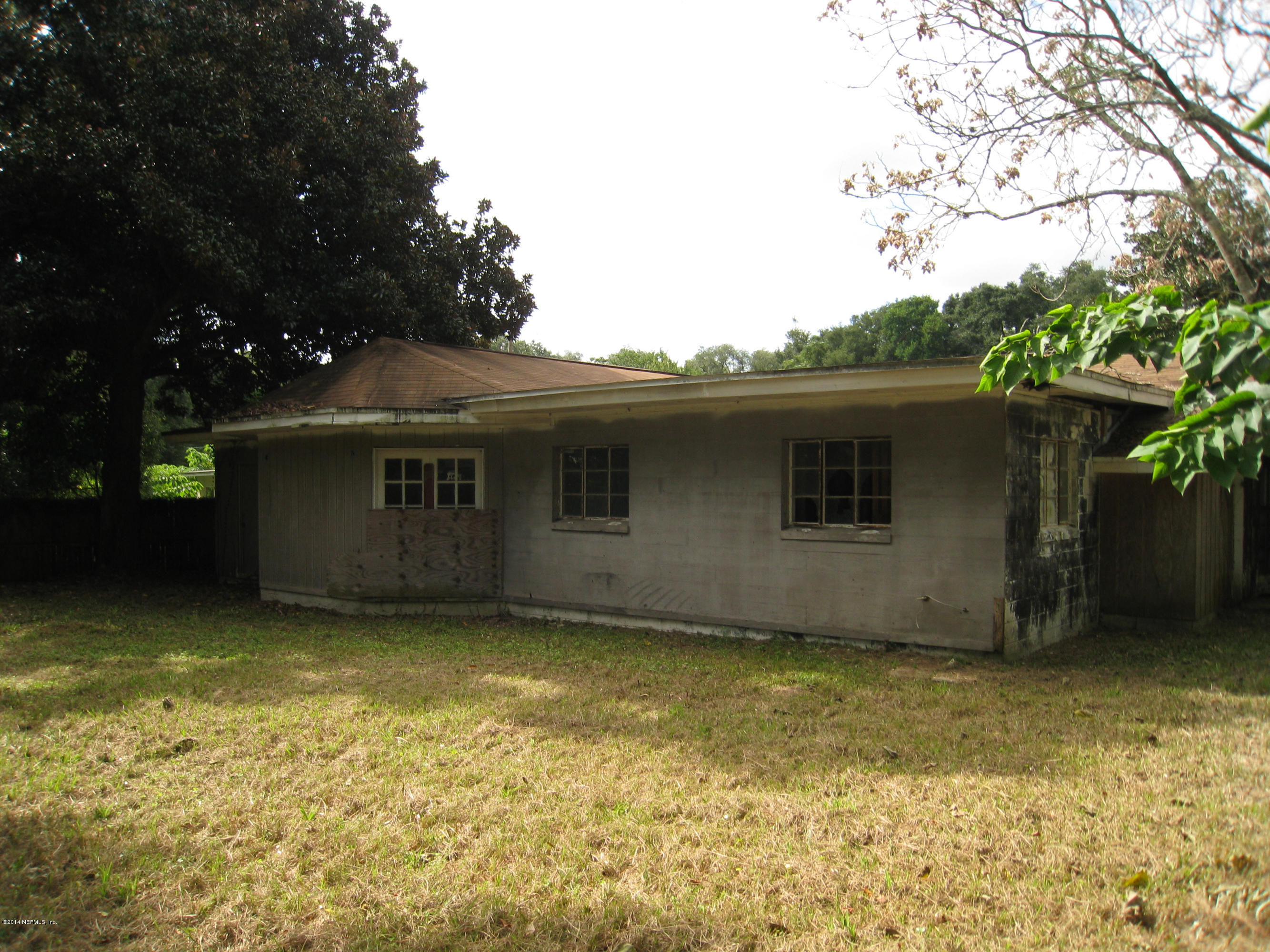 1369 Griflet Road Jacksonville, FL 32211 - Photo 5 of 16 a view of a house with a garage