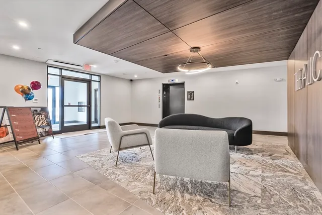 a living room with a couch and a table