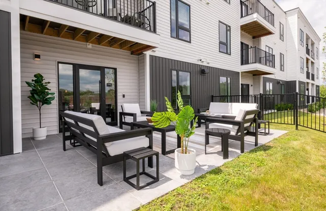 a building outdoor space with patio furniture