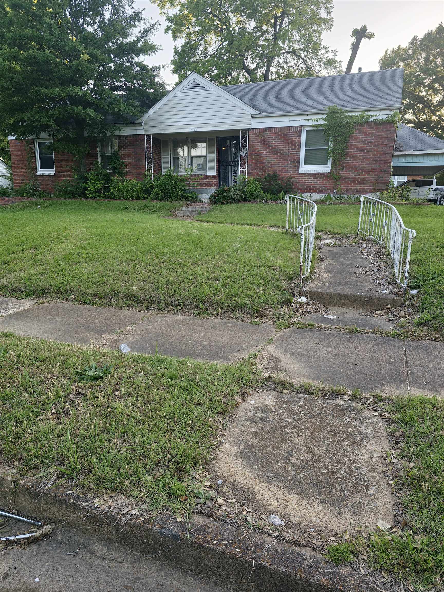 1515 Semmes Street Memphis, TN 38114 - Photo 3 of 9 Brick residence featuring a gabled roofline and a covered entry porch