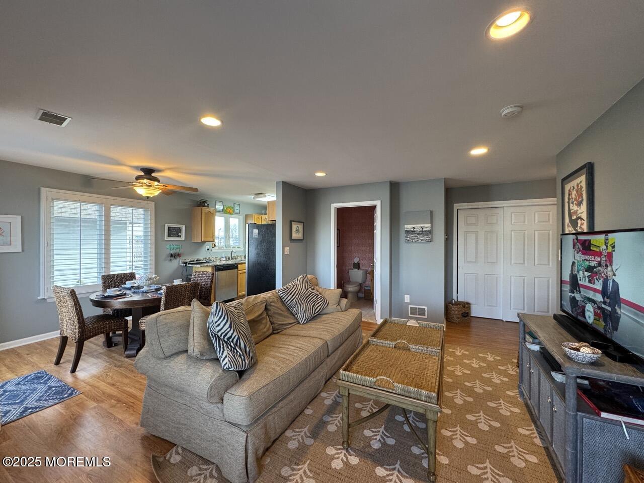 200 South Concourse, Unit 8 Neptune Township, NJ 07753 - Photo 3 of 17 a living room with furniture and a flat screen tv