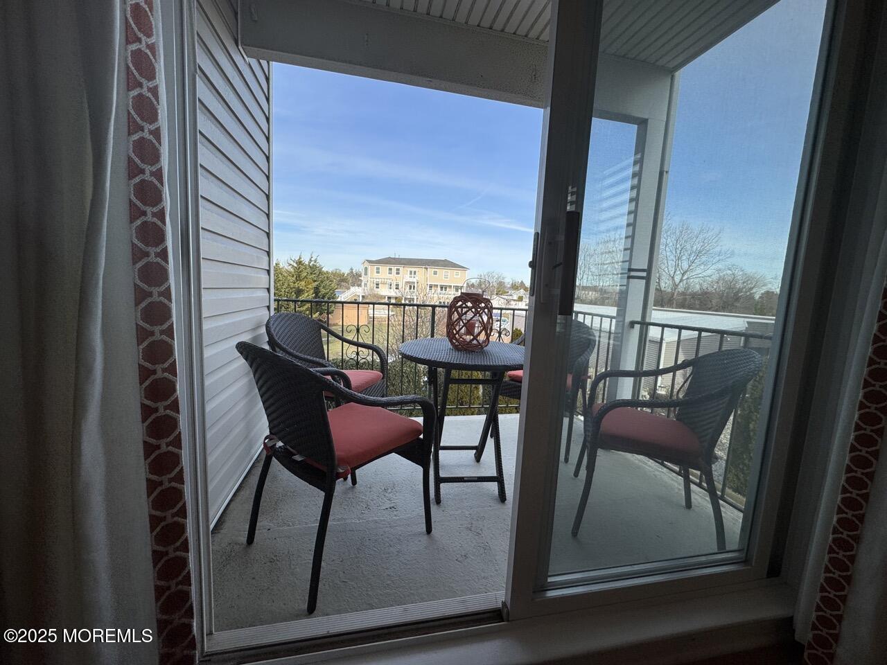 200 South Concourse, Unit 8 Neptune Township, NJ 07753 - Photo 5 of 17 a view of a chairs and table in the balcony