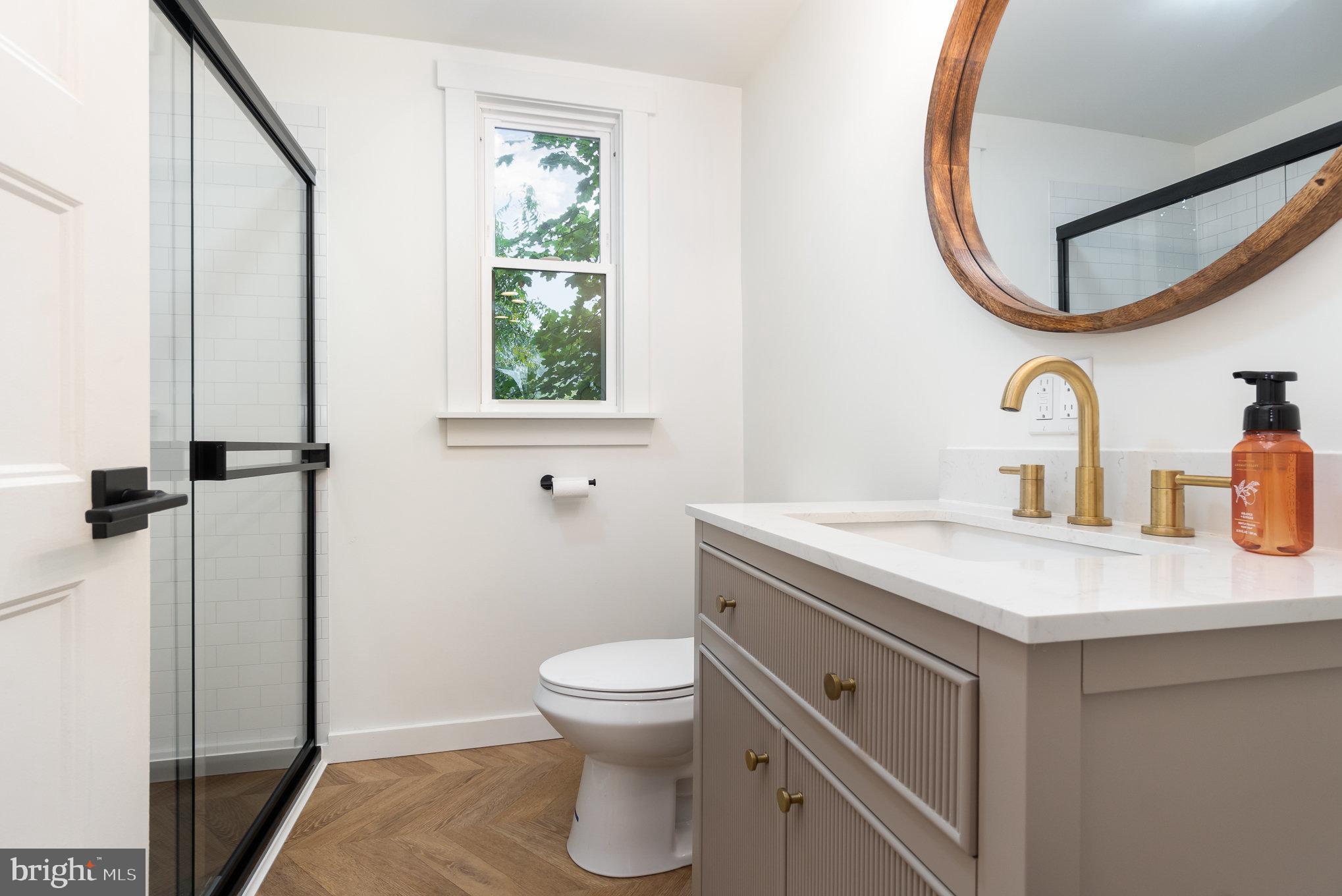 699 North Front Street Liverpool, PA 17045 - Photo 17 of 44 a bathroom with a toilet sink and mirror