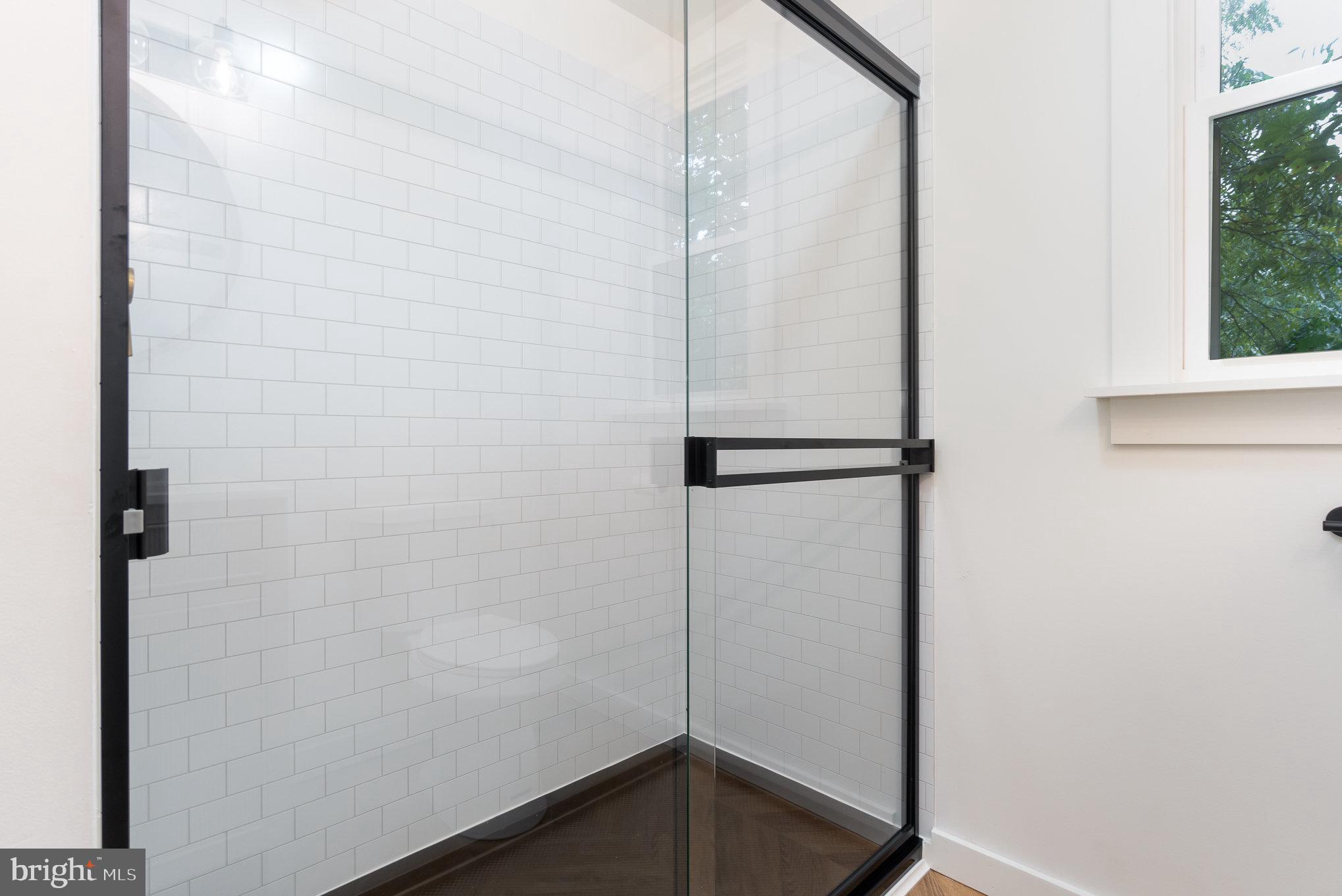 699 North Front Street Liverpool, PA 17045 - Photo 18 of 44 a bathroom with a glass shower door