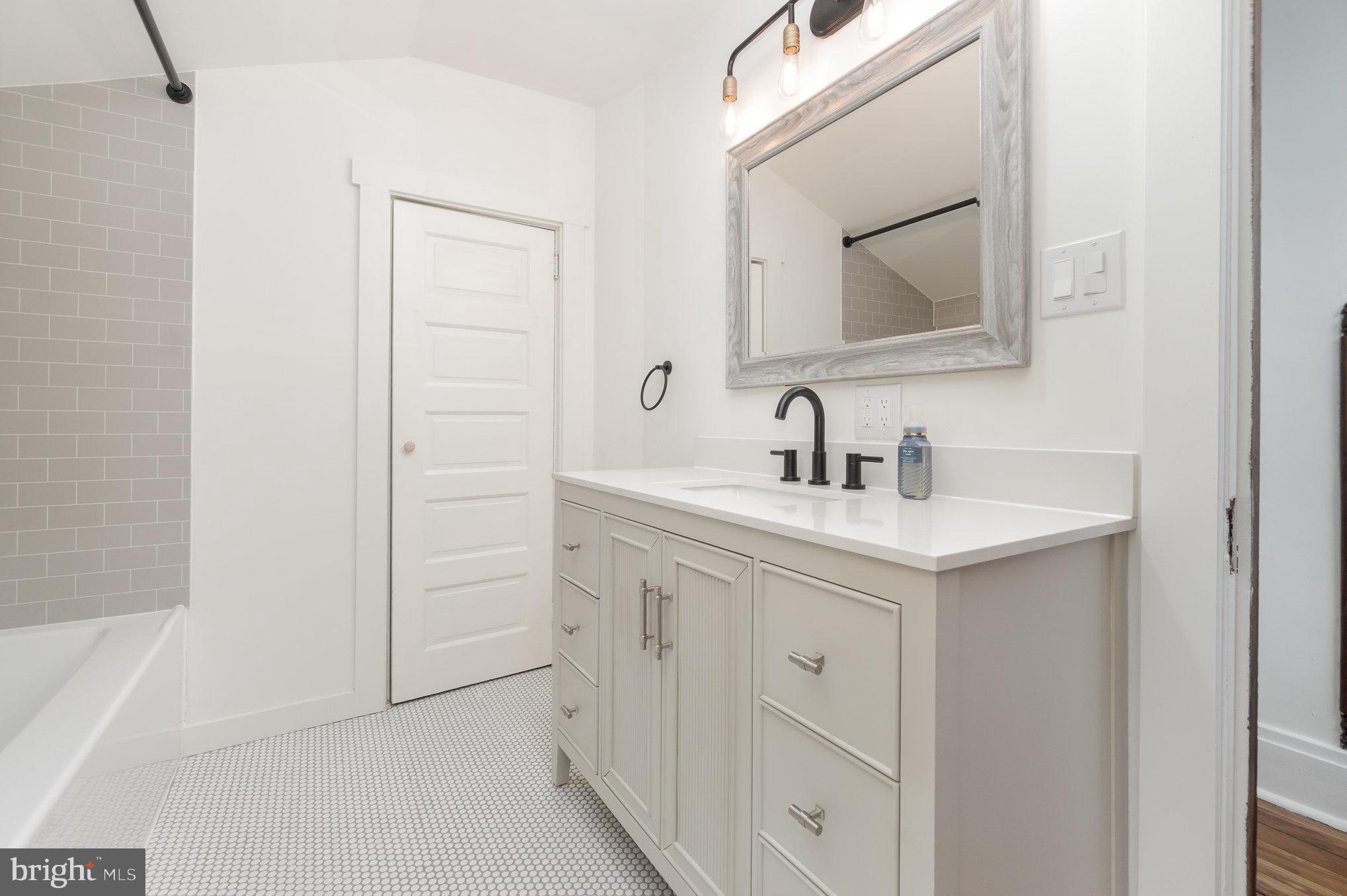 699 North Front Street Liverpool, PA 17045 - Photo 25 of 44 a bathroom with a sink and a mirror