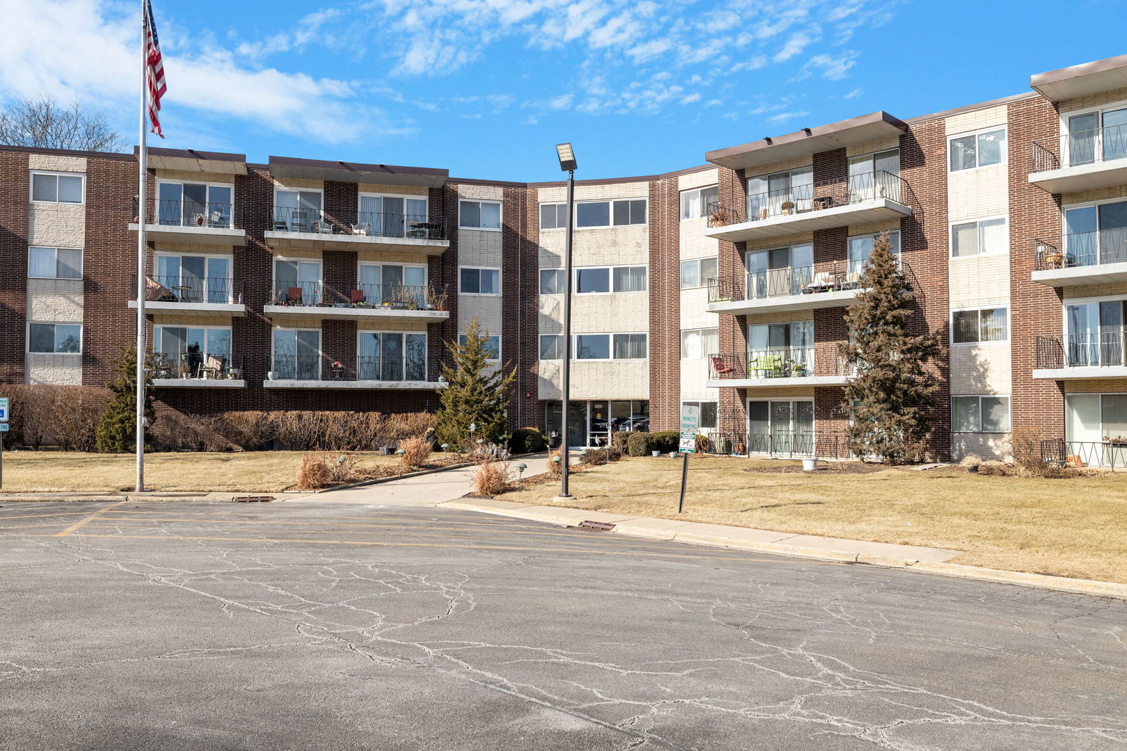 5540 Walnut Avenue, Unit 11B Downers Grove, IL 60515 - Photo 1 of 27 a view of a building with a street