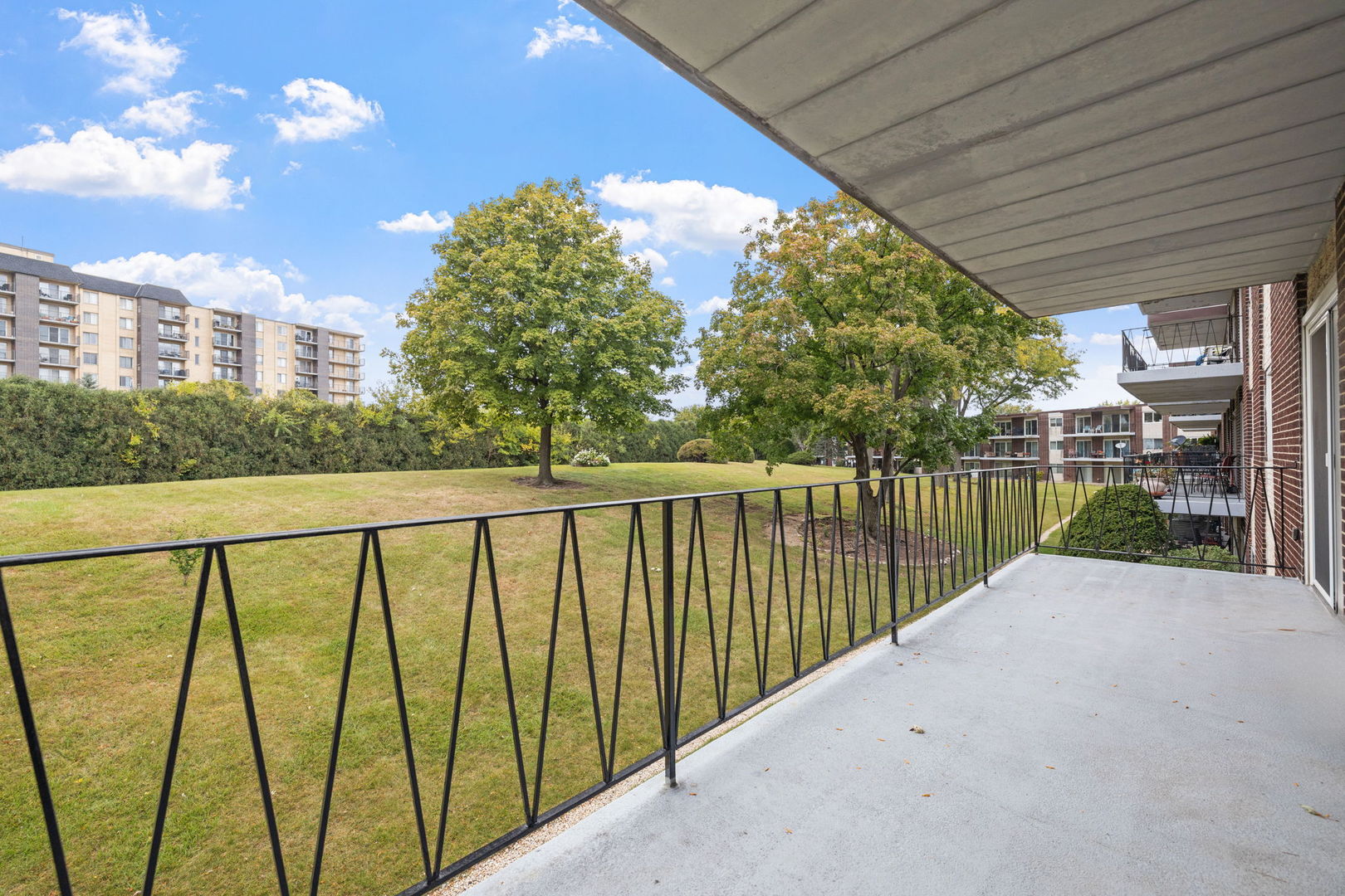 5540 Walnut Avenue, Unit 11B Downers Grove, IL 60515 - Photo 26 of 27 a view of balcony with yard