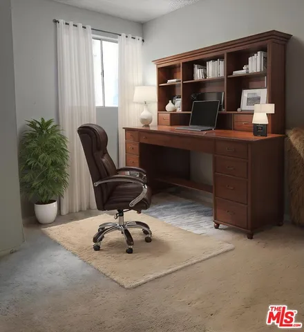 a work room with furniture and a potted plant