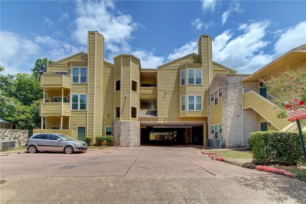 a car parked in front of a building