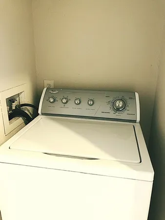 a utility room with washer and dryer