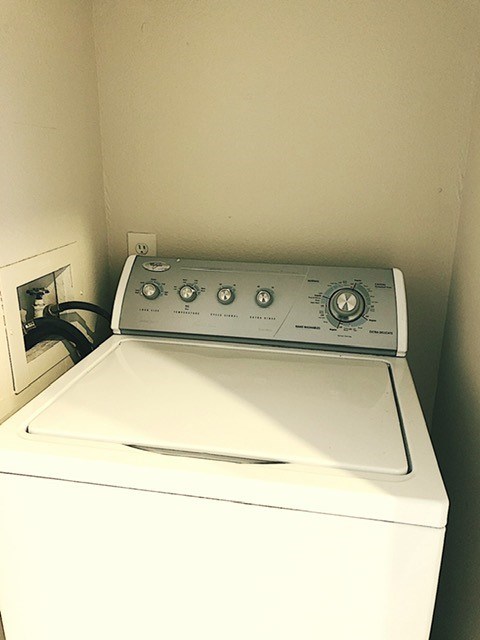 808 West 29th Street, Unit 301 Austin, TX 78705 - Photo 15 of 24 a utility room with washer and dryer