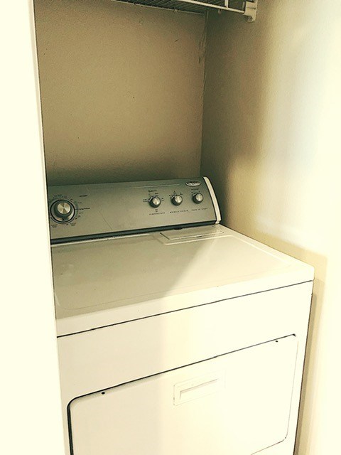 808 West 29th Street, Unit 301 Austin, TX 78705 - Photo 16 of 24 a utility room with dryer and washer