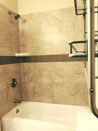 a bathroom with a sink and a shower