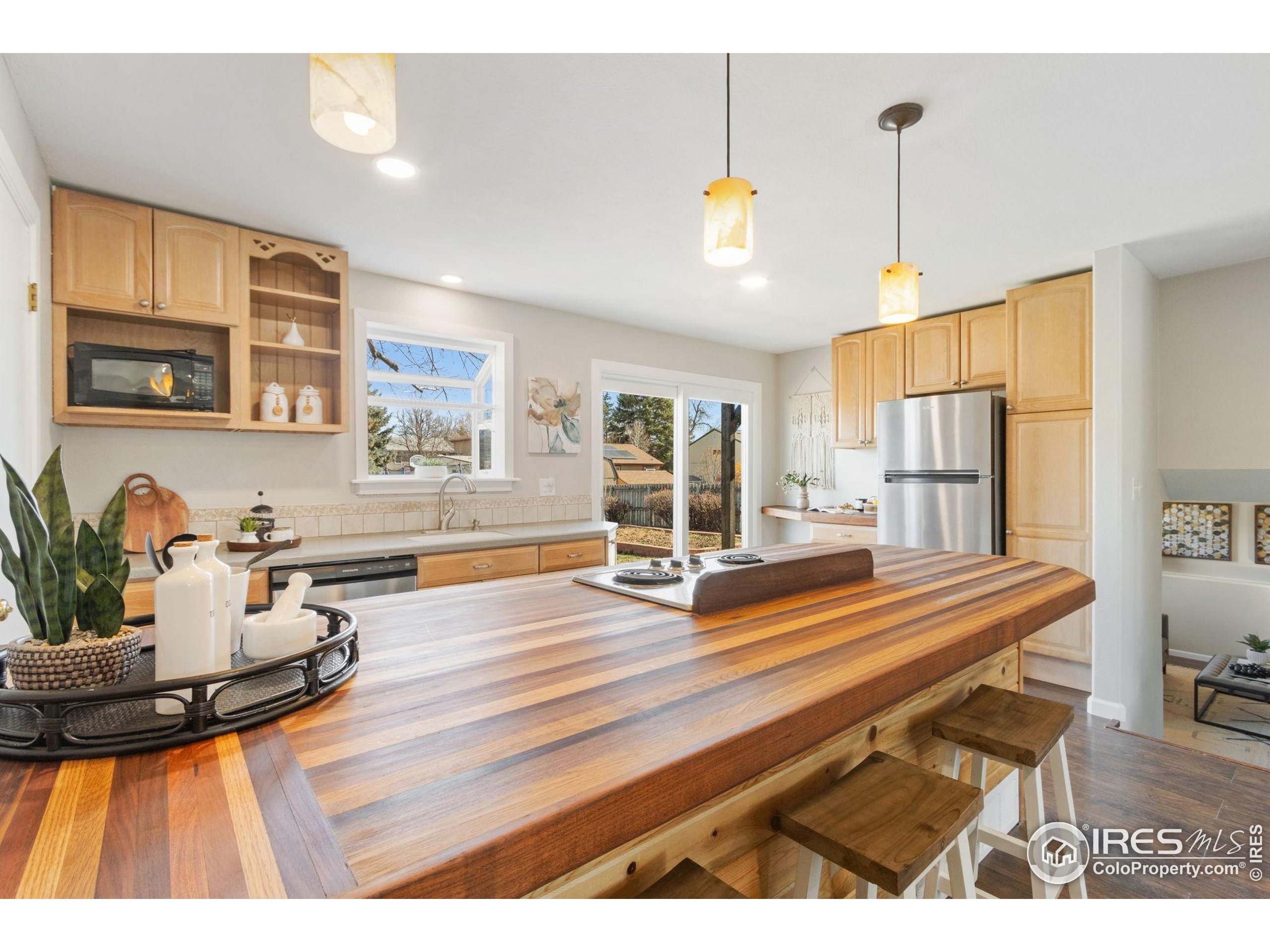 3024 Placer Court Fort Collins, CO 80526 - Photo 18 of 40 a living room with furniture and wooden floor