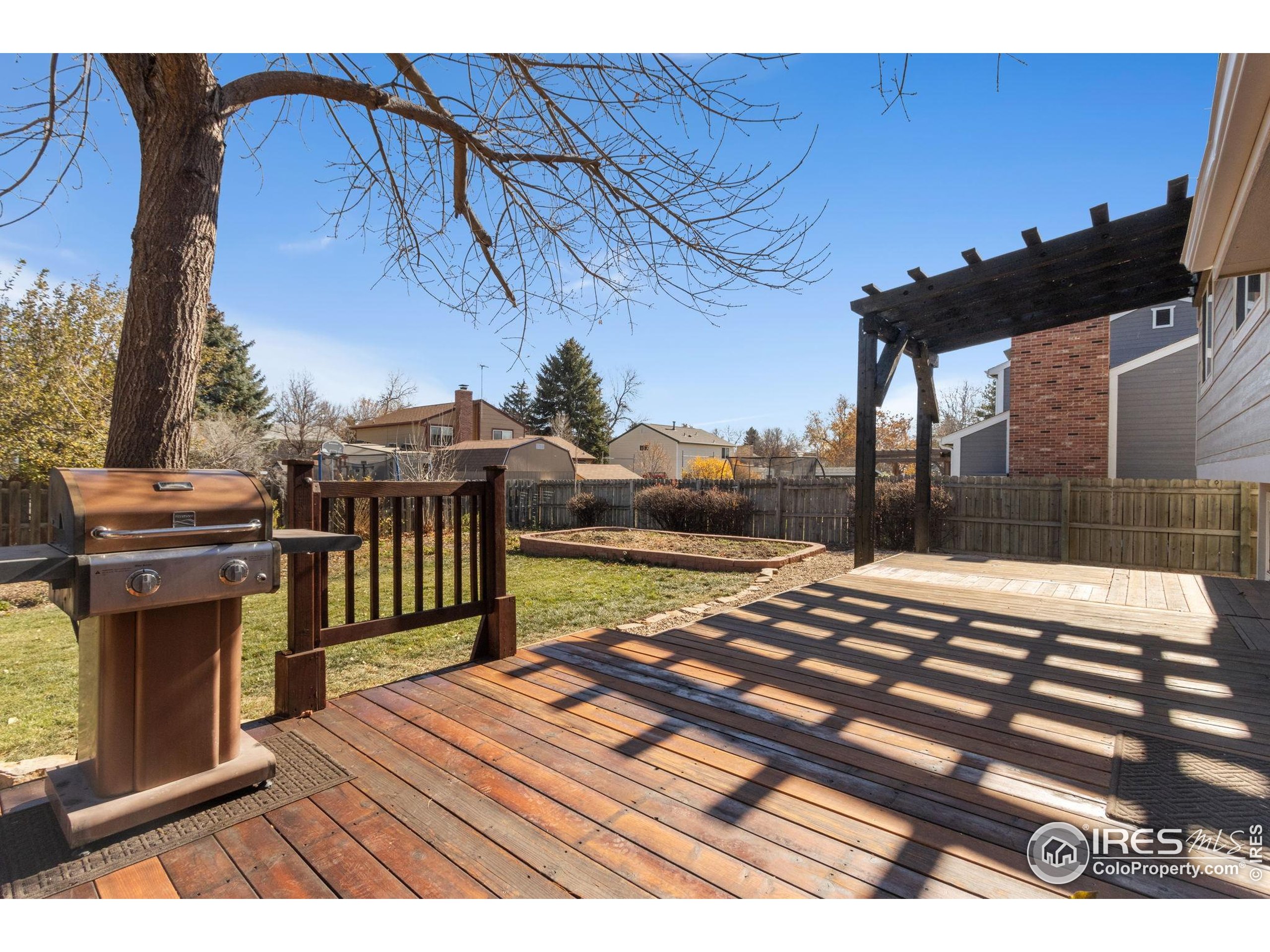 3024 Placer Court Fort Collins, CO 80526 - Photo 36 of 40 a view of a balcony with wooden floor