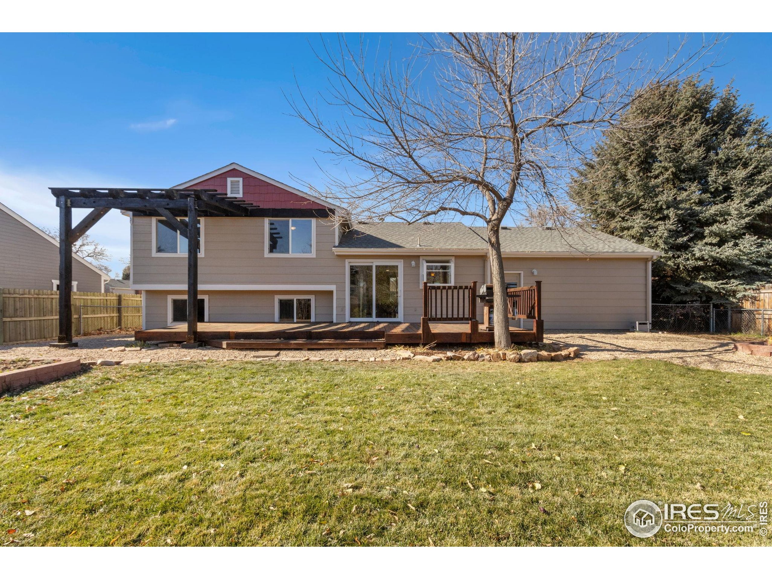 3024 Placer Court Fort Collins, CO 80526 - Photo 38 of 40 a view of a house with pool and chairs
