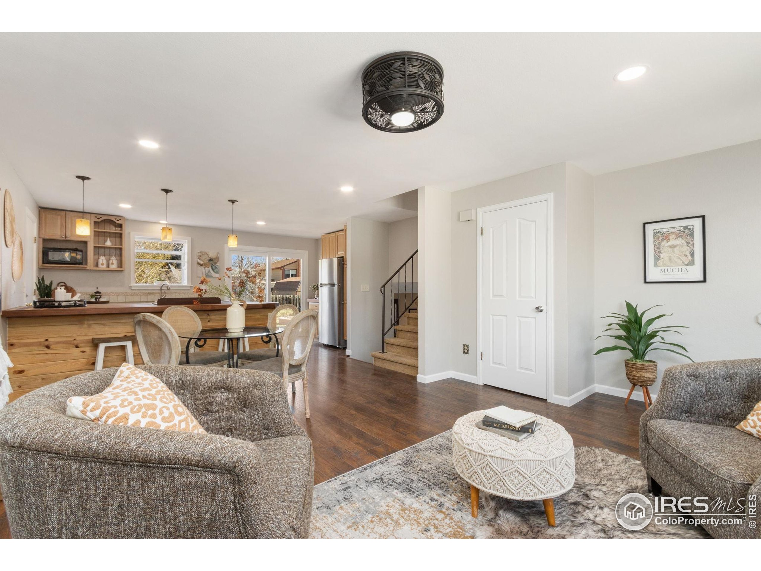 3024 Placer Court Fort Collins, CO 80526 - Photo 8 of 40 a living room with furniture and a table