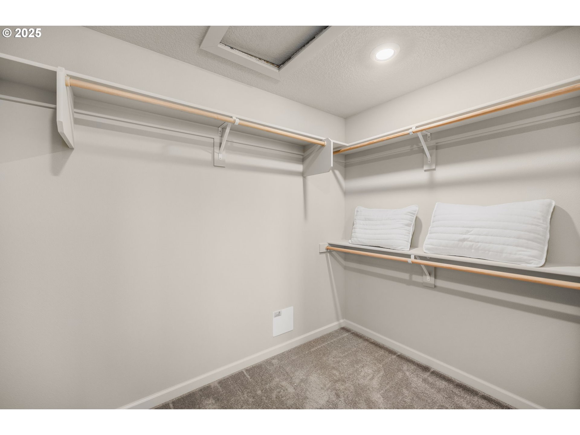 2600 South 6th Way Ridgefield, WA 98642 - Photo 14 of 33 a view of a room with racks on the wall