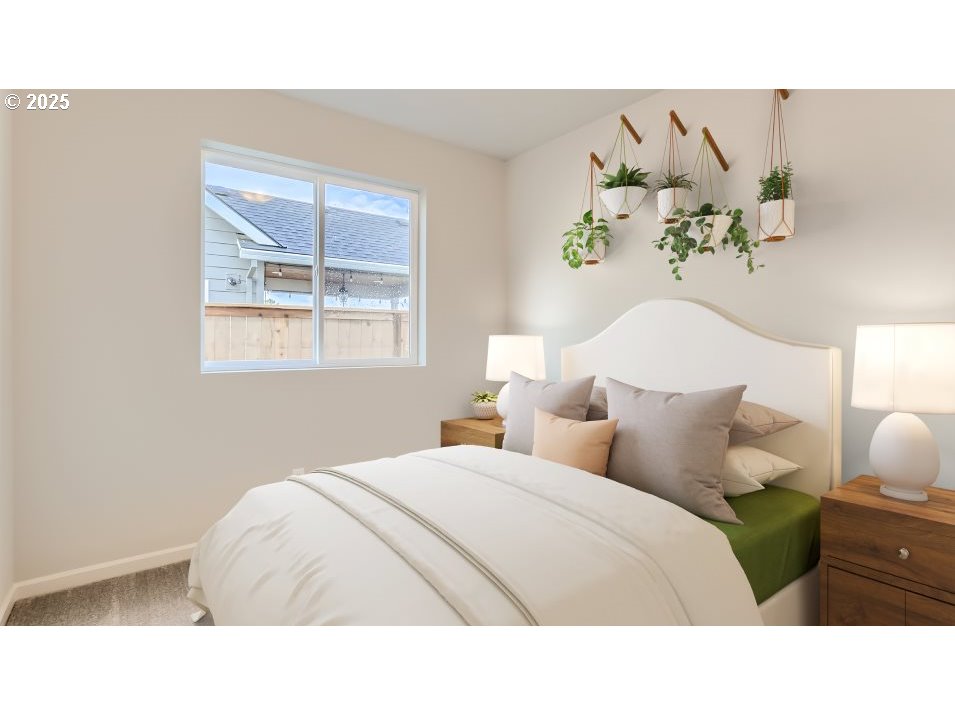 2600 South 6th Way Ridgefield, WA 98642 - Photo 15 of 33 a bedroom with a bed and a painting on the wall