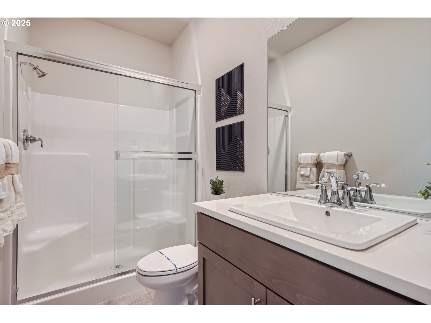 2600 South 6th Way Ridgefield, WA 98642 - Photo 18 of 33 a bathroom with a sink toilet and shower