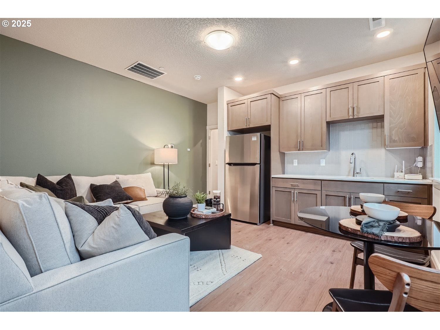 2600 South 6th Way Ridgefield, WA 98642 - Photo 20 of 33 a living room with furniture and a wooden floor