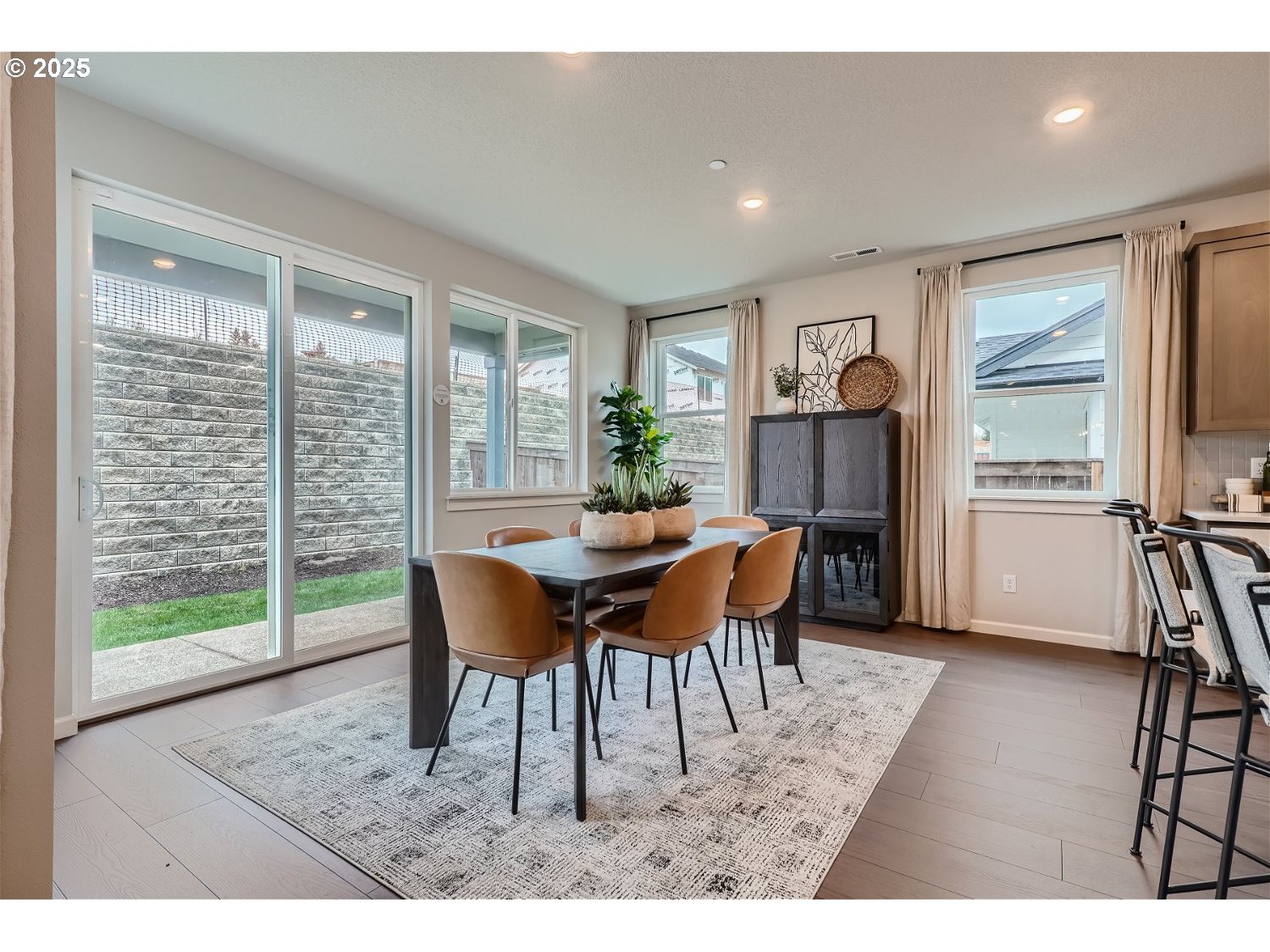 2600 South 6th Way Ridgefield, WA 98642 - Photo 7 of 33 a view of a dining room with furniture window and wooden floor