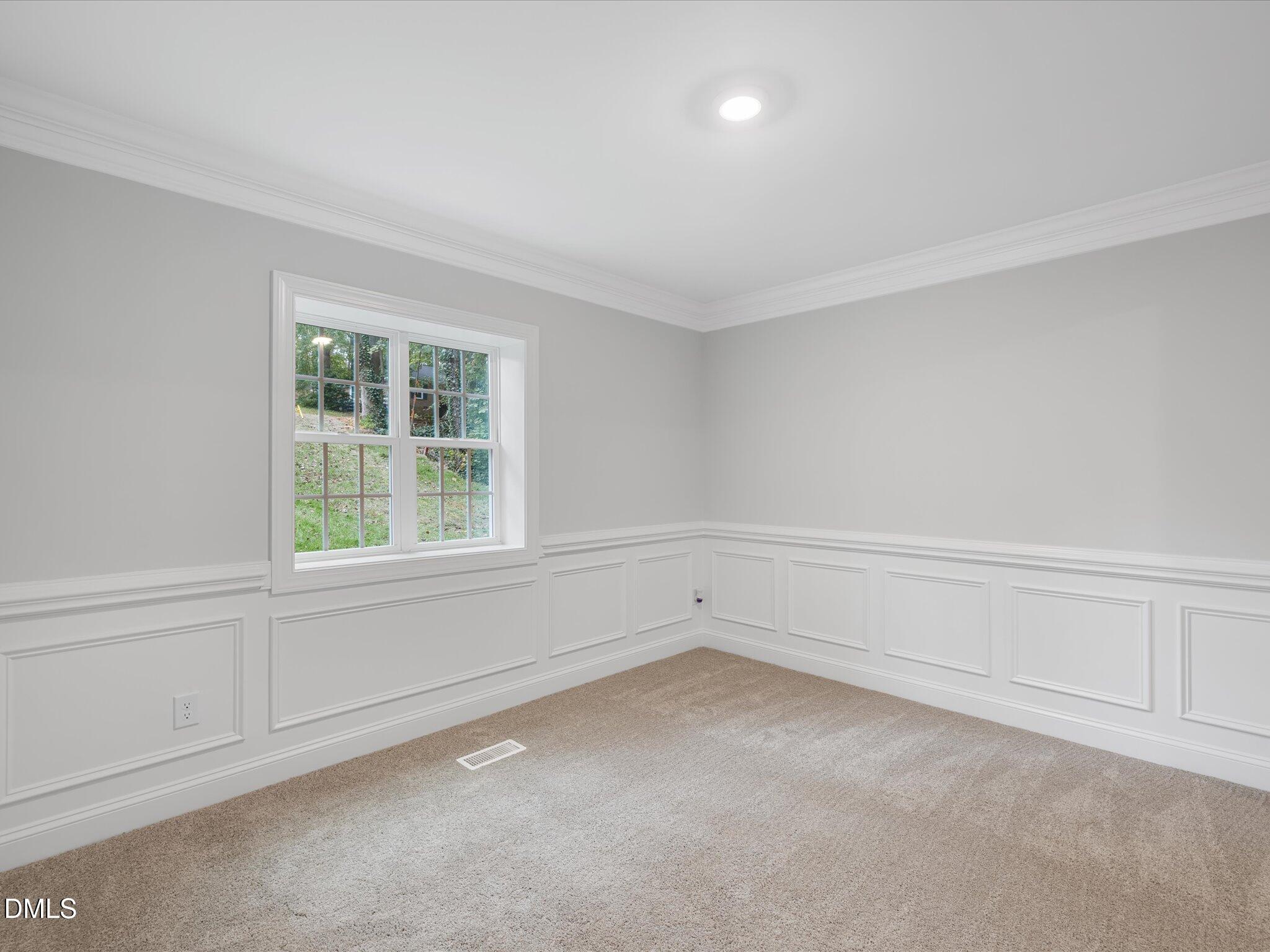 316 Howland Avenue Cary, NC 27513 - Photo 18 of 34 a view of an empty room with a window