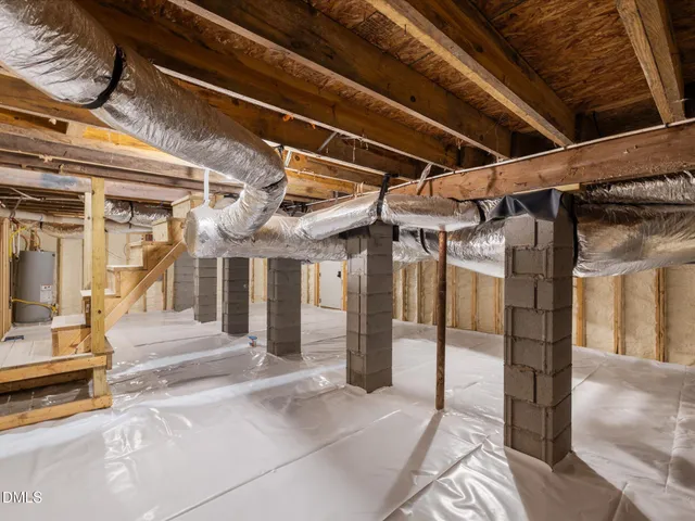 a balcony with table and chairs
