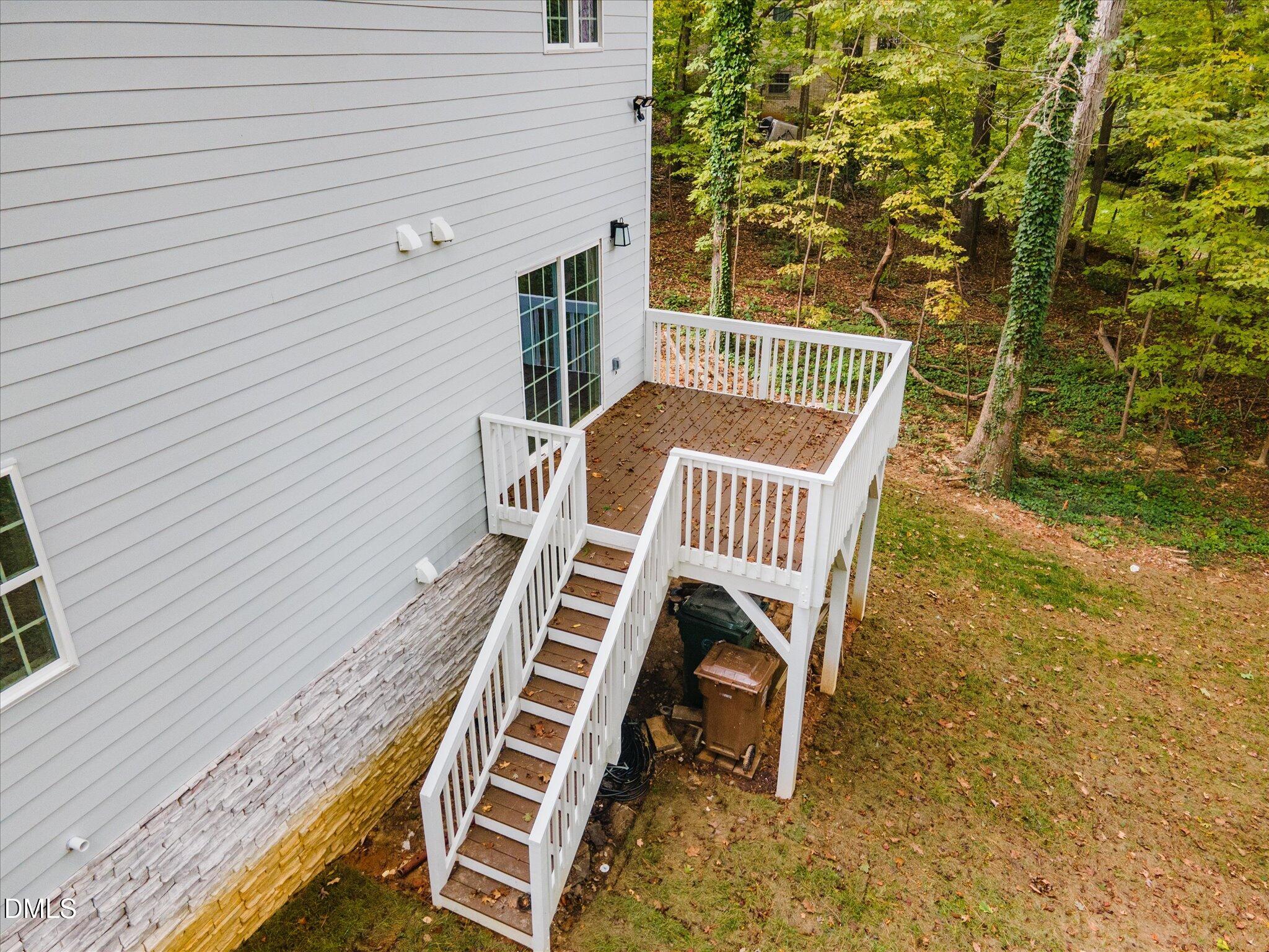 316 Howland Avenue Cary, NC 27513 - Photo 28 of 34 a balcony with table and chairs