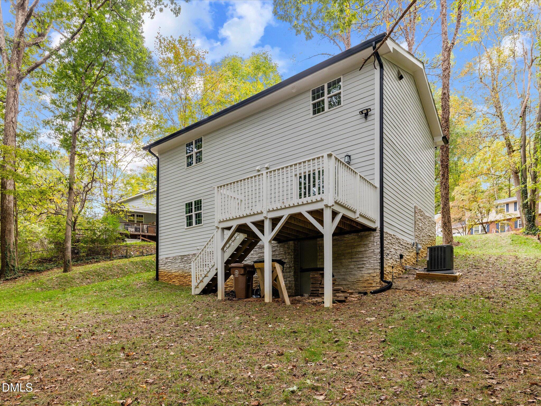 316 Howland Avenue Cary, NC 27513 - Photo 29 of 34 a view of a house with backyard