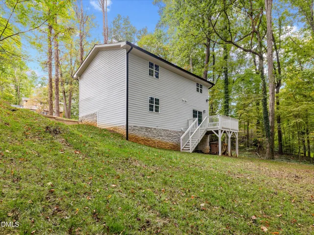 a view of a back yard of the house