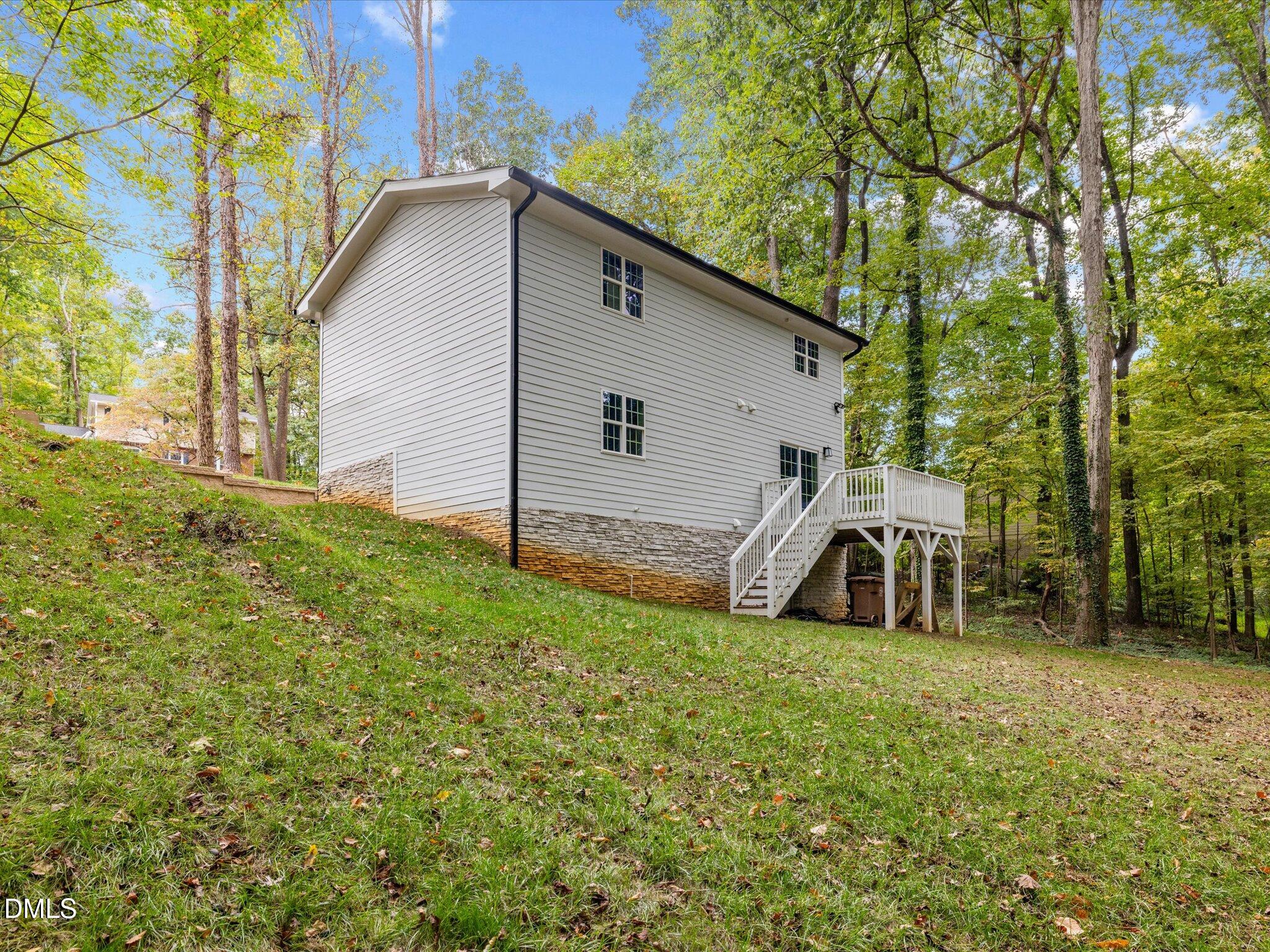 316 Howland Avenue Cary, NC 27513 - Photo 31 of 34 a view of a house with backyard