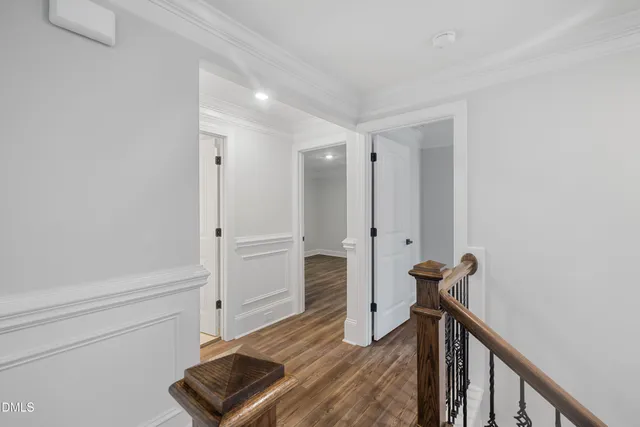 a view of a hallway with staircase