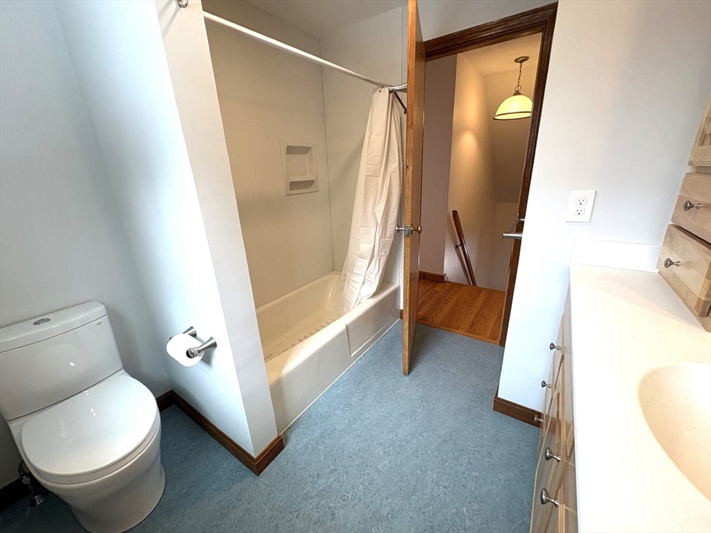 208 Rolling Ridge Road Amherst, MA 01002 - Photo 34 of 40 a bathroom with a toilet and a tub