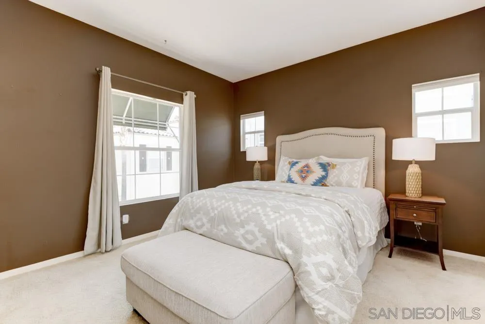 11650 Miro Circle San Diego, CA 92131 - Photo 15 of 28 a bedroom with a bed and a window