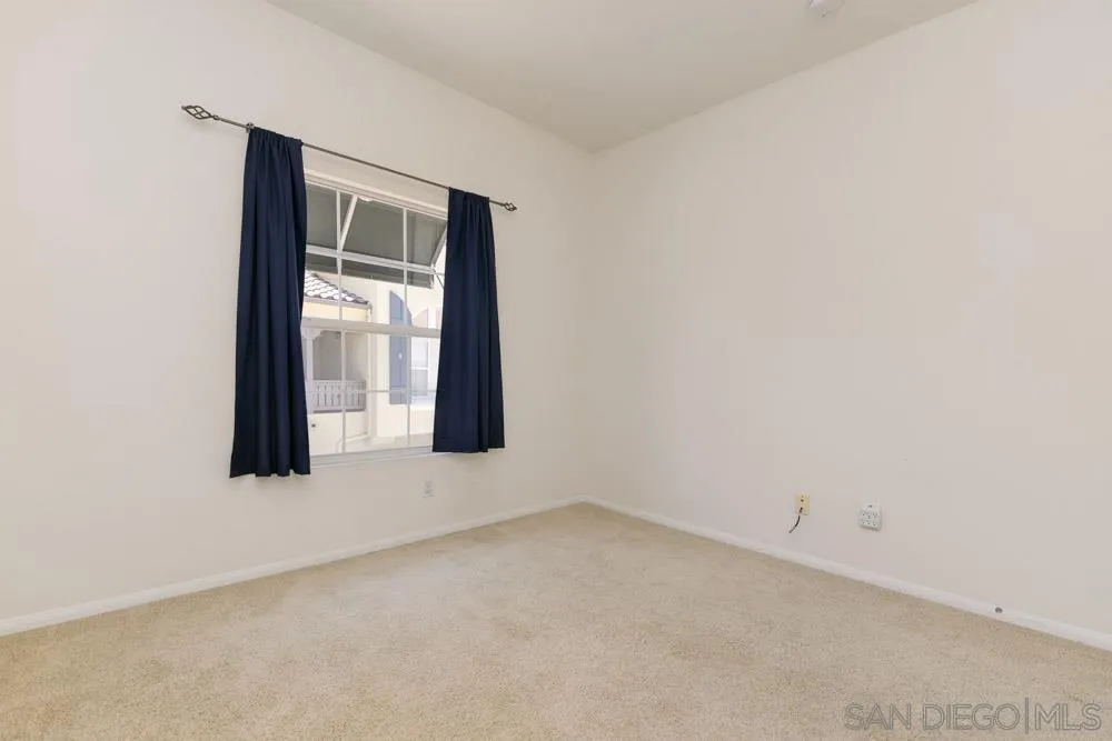 11650 Miro Circle San Diego, CA 92131 - Photo 19 of 28 an empty room with a window