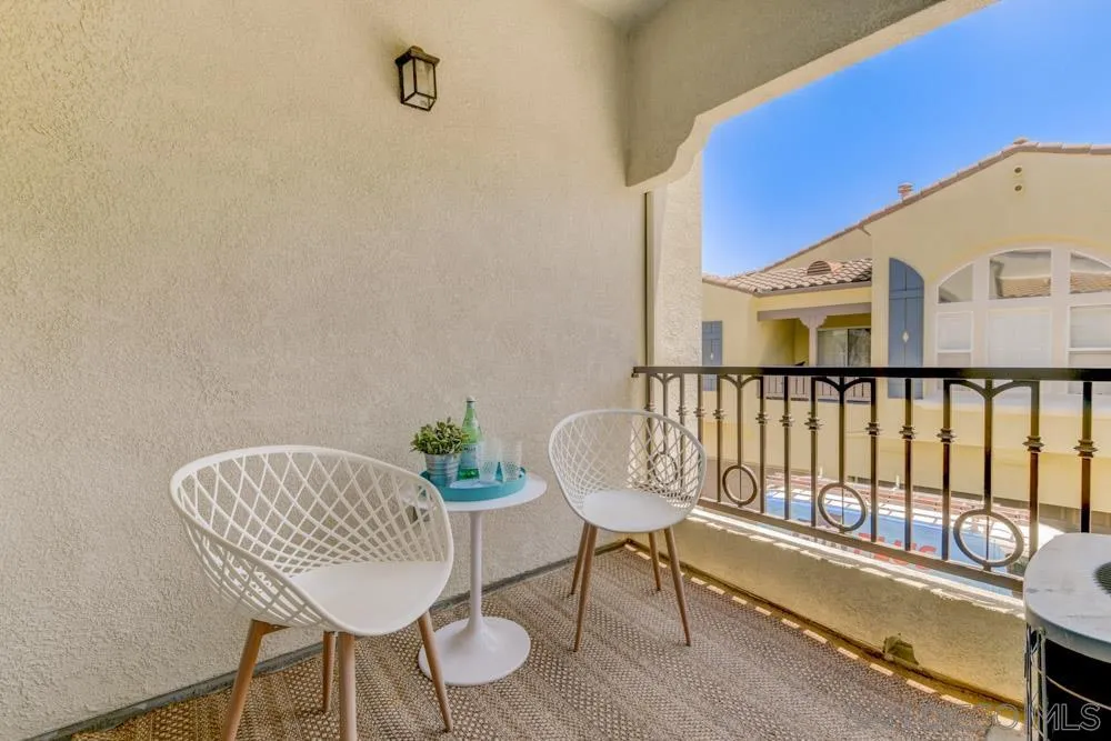11650 Miro Circle San Diego, CA 92131 - Photo 21 of 28 a view of a chair and table in the balcony