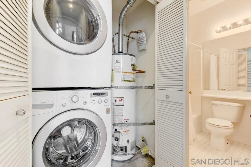 11650 Miro Circle San Diego, CA 92131 - Photo 23 of 28 a close view of a utility room with dryer and washer