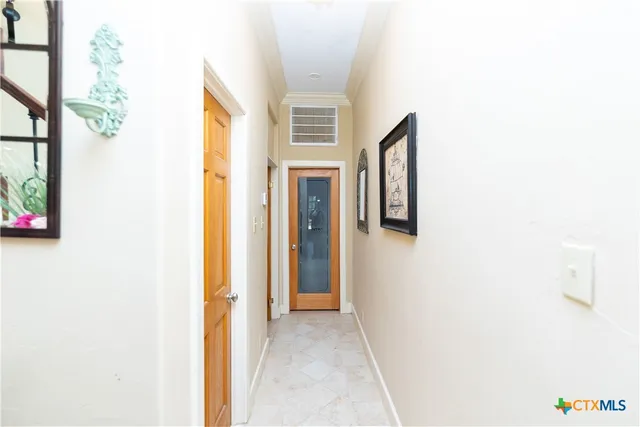 a view of entryway with a front door