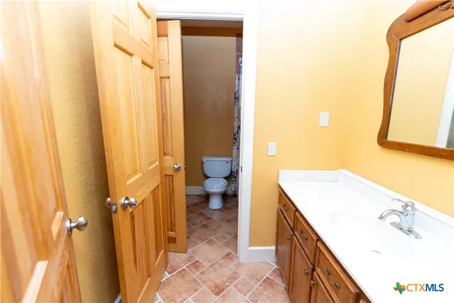 a living room with a rug