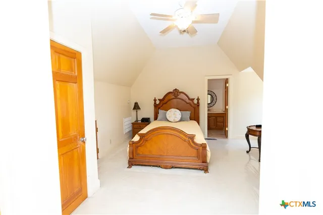 a swimming pool with outdoor seating and yard