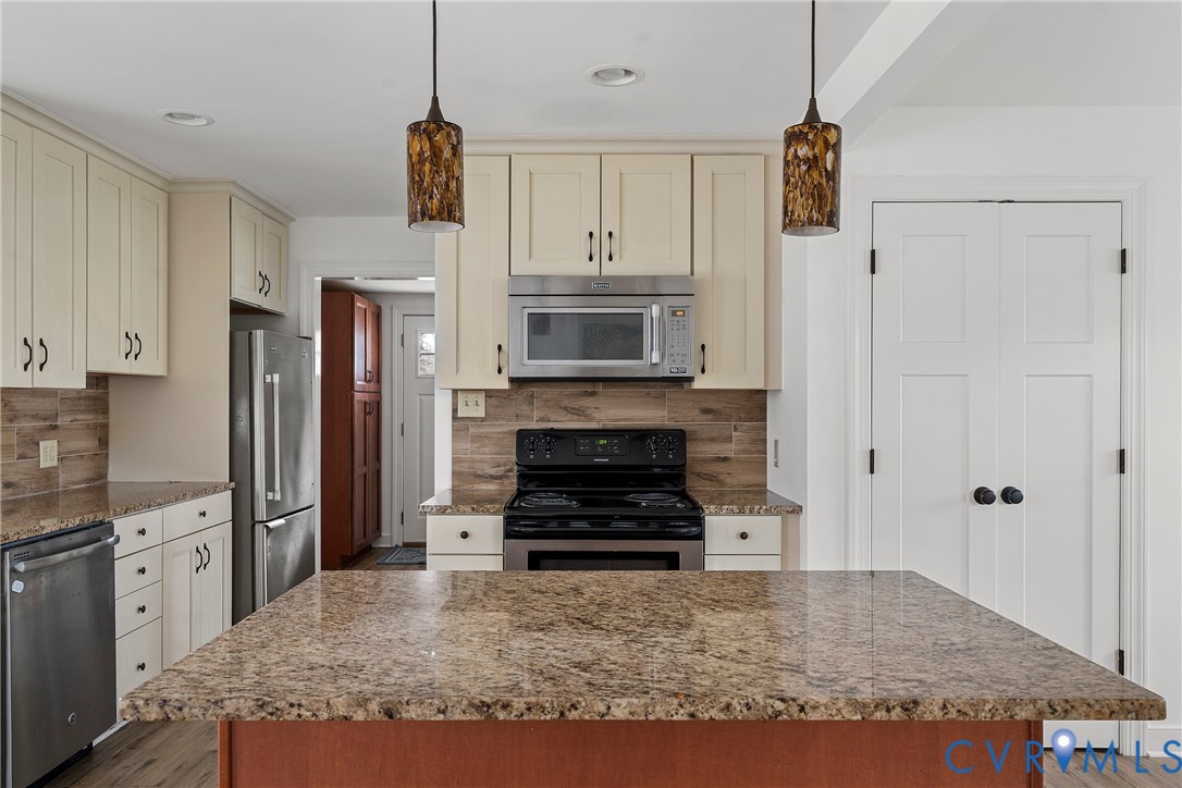 15141 Brown Pleasants Road Montpelier, VA 23192 - Photo 13 of 46 Kitchen featuring cream cabinets, appliances with