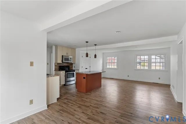 a view of kitchen and wooden floor