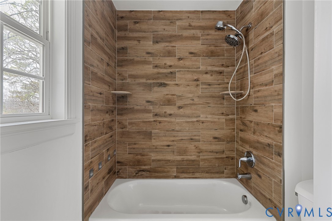 15141 Brown Pleasants Road Montpelier, VA 23192 - Photo 17 of 46 Bathroom with bathtub / shower combination and toi