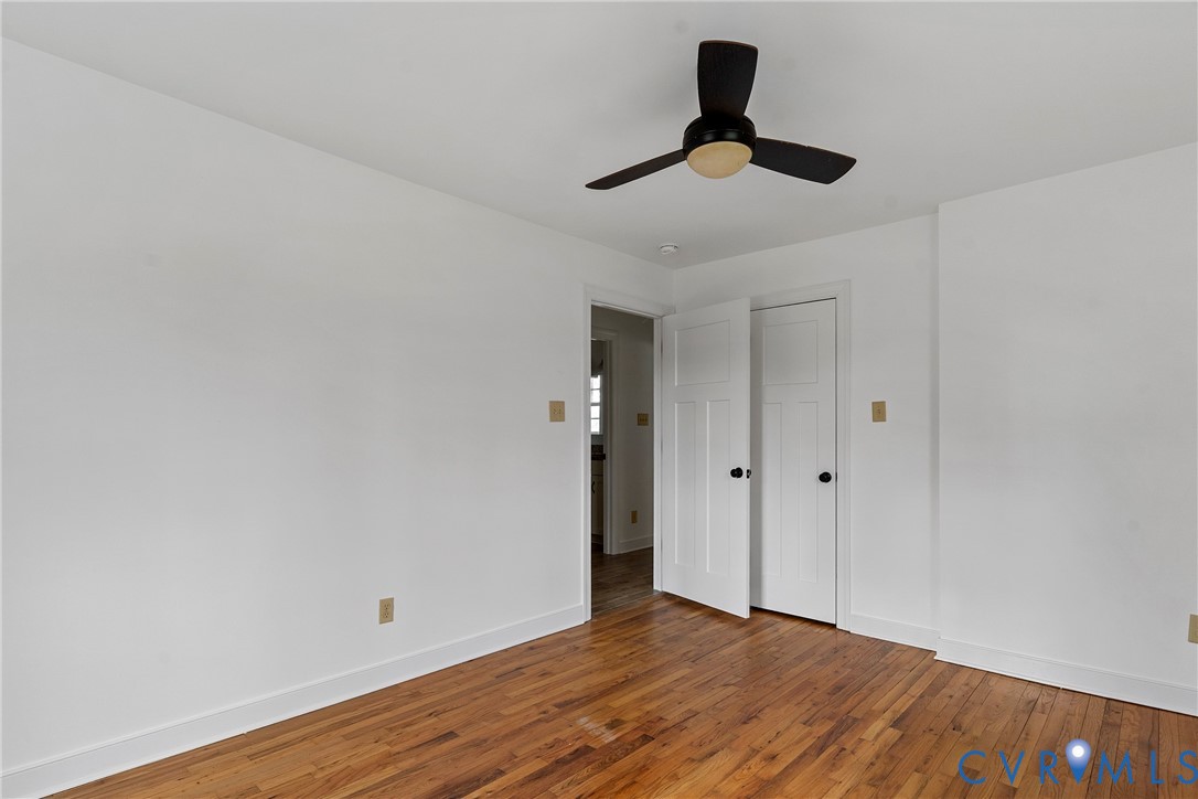 15141 Brown Pleasants Road Montpelier, VA 23192 - Photo 20 of 46 Unfurnished bedroom featuring wood-type flooring,