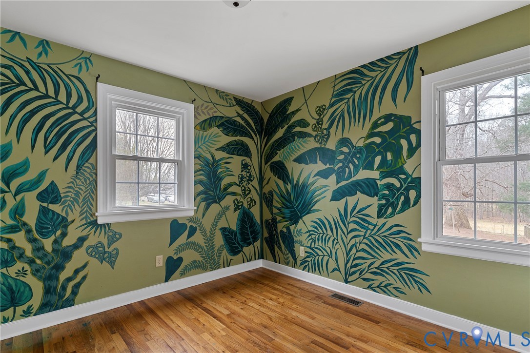 15141 Brown Pleasants Road Montpelier, VA 23192 - Photo 21 of 46 Unfurnished room featuring hardwood / wood-style f