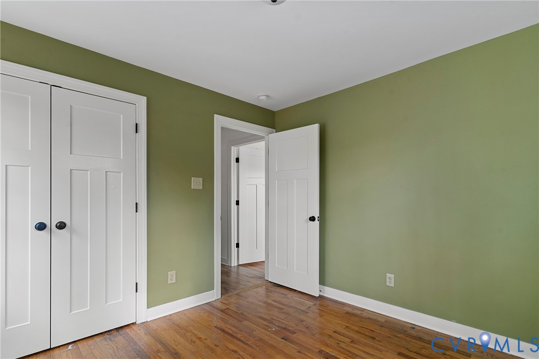 15141 Brown Pleasants Road Montpelier, VA 23192 - Photo 22 of 46 Unfurnished bedroom with a closet and hardwood / w