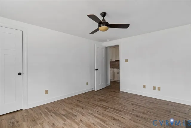 a view of an empty room and window