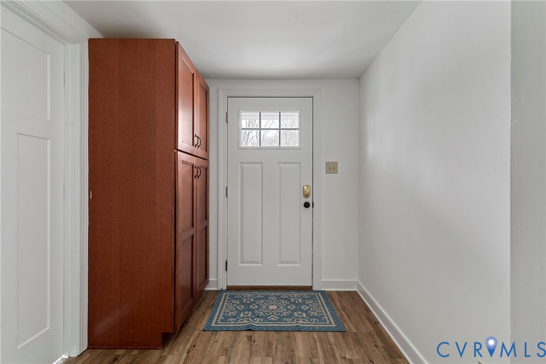 15141 Brown Pleasants Road Montpelier, VA 23192 - Photo 28 of 46 Back Doorway with wood finished floors and baseboa
